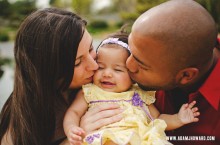 Mom and Dad Kissing Baby in a Japanese Garden in Los Angeles