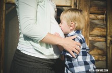 Photograph of Son Kissing Baby Bump Maternity Photography Jackson Hole WY