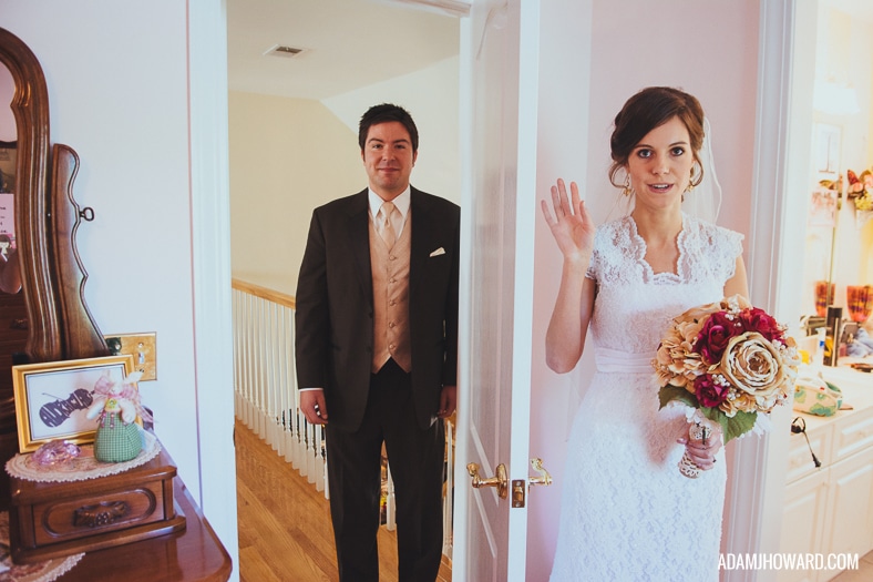 couple does a first look separated by a door