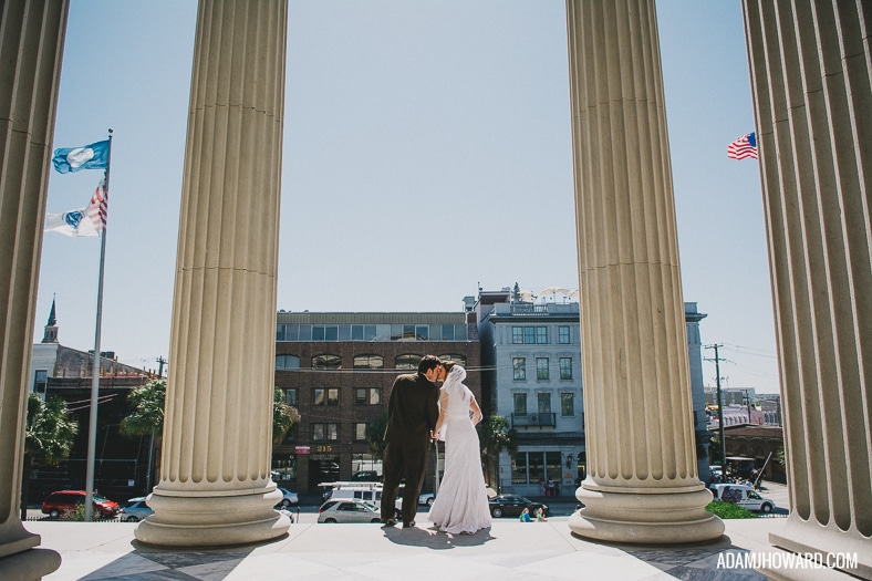 couple in front of charleston customs house